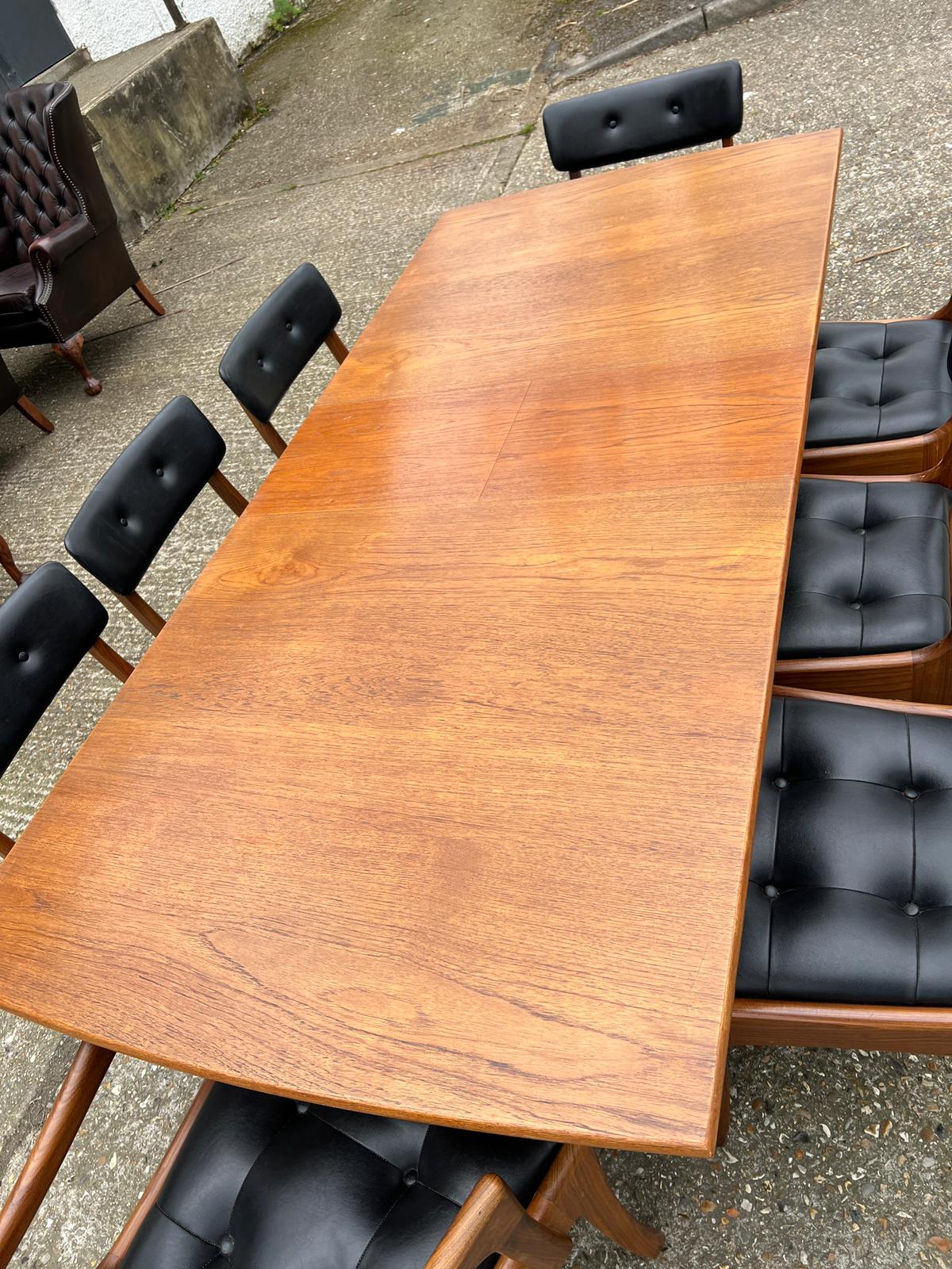 An extending teak dining table by Vanson along with the Vanson for Heals eight chairs whit black - Image 9 of 15