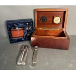 A gentleman's companion set to include Humidor cigar cutter and case and hip flask