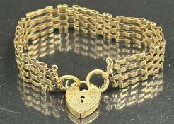 A 9ct yellow gold gate bracelet with heart shaped fastner, approximate total weight 16.3g