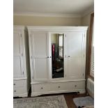 A white three door wardrobe with three drawers below and hanging space above (H200cm W165cm D55cm)