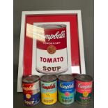 A set of four Andy Warhol Foundation Campbells tomato soup cans, limited edition and a framed