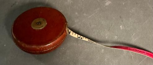 A vintage draughtsman's and a Chesterman's constantia tape measure
