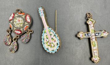 A selection of three mini mosaics to include a mandolin crucifix and a heart shaped pendant