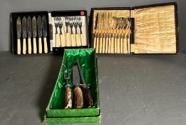 Two boxed fish knives and a boxed horn handled carving set