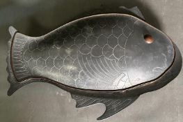 A French hand made metal lidded platter in the form of a fish with copper rim and eye