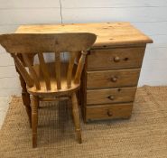 A pine desk with knee hole and drawers to right hand side with a pine chair (H74cm W92cm D44cm)