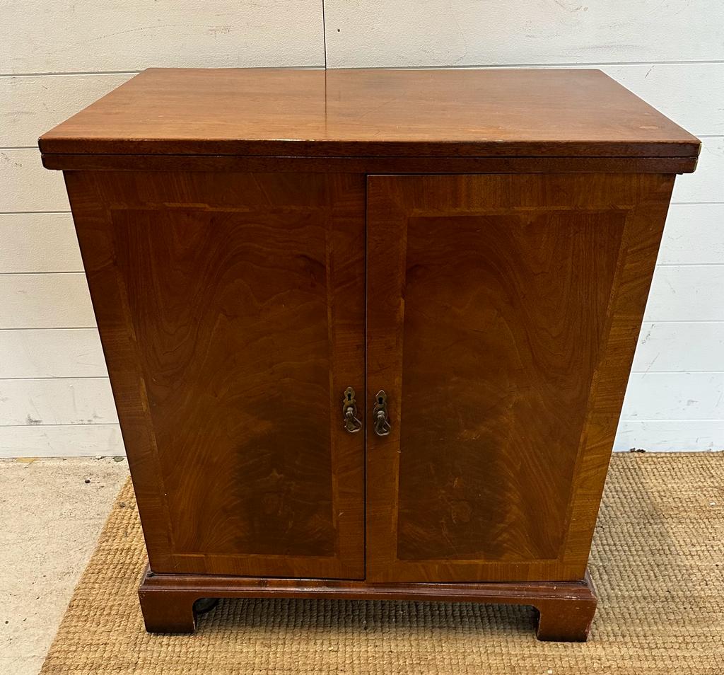 An Edwardian style media unit with inlay and brass handles (H86cm W78cm D49cm)