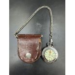 A Swizz Army pocket watch in leather carry case.
