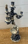 A blue and white figural Sitzendorf Candelabra AF Condition Report damage to basket and hands
