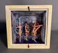A selection of exotic dancing figures in a glaze display case