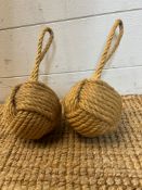 Two knotted door stops