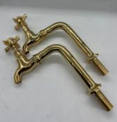 A pair of brass taps