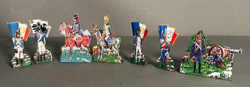 Seven vintage flat backed tin soldiers depicting Napoleonic scene