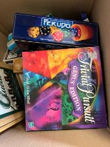 A selection of board games including Monopoly, Triva Pursuit etc