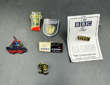 A selection of pin badges from the BBC and the Cricket World Cup 1999