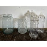 Three plastic sweet shop style jars and two glass vases