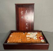 A cased Mahjong set
