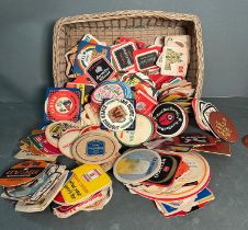 A collection of vintage beer mats to include Carling Black Label, Philips Jumbo Stout, etc