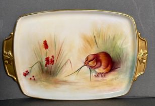 A hand-painted and signed by artist china tray, titled 'Orkeney Vole', M Bates 1979.