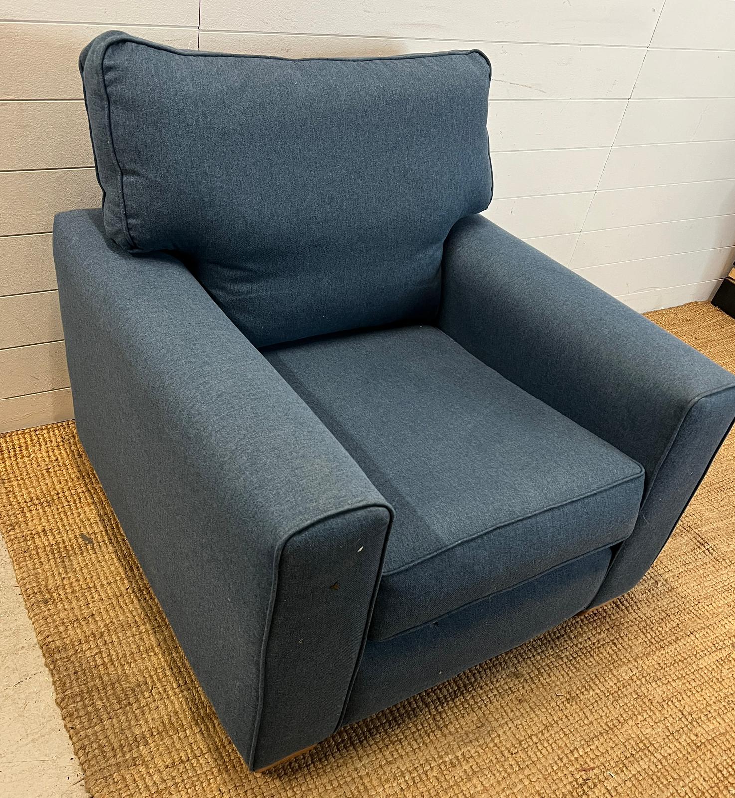 A blue arm chair by Thorngate