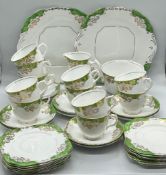 A part tea set of green and gilt pattern by Lawleys