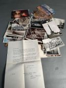 A selection of vintage postcards including some WWII military