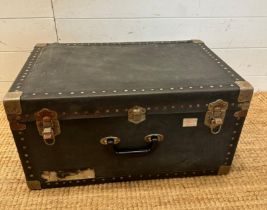 A vintage blue travel trunk with metal corners, studded detail and central handle (28cm x 58cm x