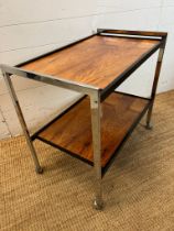 A Mid Century drinks trolly by Howard Miller produced by M.D.A