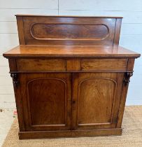 A Victorian chiffonier with a single long drawer and two door cupboard under and a galleried top (