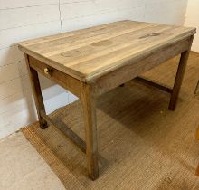 A rustic pine kitchen table with single drawer to end (Height 77 x 74 x 121)