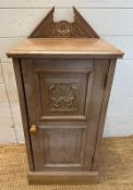 A wooden floor standing side cabinet with carved galleried top and a single shelf cupboard with