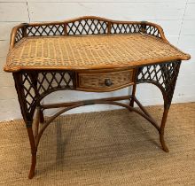 A vintage Ralph Lauren style two tone rattan writing table, single drawer and a galleried top (H88cm