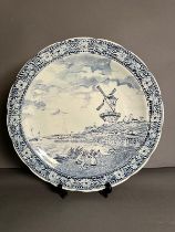 A Boch Delft's Charger, blue and white Windmill scene, 39.5cm in diameter.