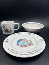 A Wedgewood Beatrix Potter nursing set comprising of bowl, plate and mug