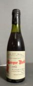 A half bottle of Andre Roux 1992 Barque Vieille wine