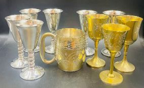 A selection of silverplated beakers and cups etc.