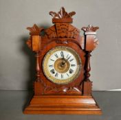 An Ansonia of New York eight day mantel clock with gilt and enamel face