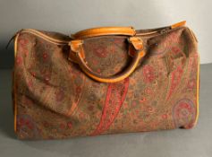 Leather and fabric handbag with palsley pattern in the style of Etro and Asprey