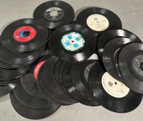 A selection of vinyl single to include Smokey Robinson, Roy Orbison and Paul Simon