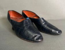 A pair of early 20th Century ladies navy blue leather shoes