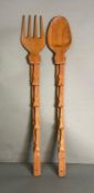 A tribal Art carved wooden spoon and fork