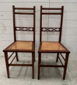 A pair of mahogany cane seated occasional chairs