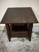 A small square side table