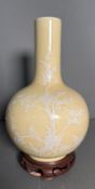 A Chinese Mid Century ivory and white hand painted bottle nosed vase
