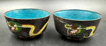 Two Cloisonne bowls, black ground with a dragon frieze
