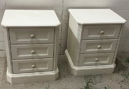 A pair of white bedsides consisting of three drawers (H63cm W52cm D44cm)