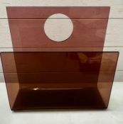 An acrylic magazine holder