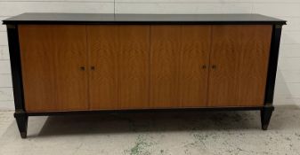 A contemporary Art Deco style sideboard by Chilewich, with two cupboards opening to drawers and