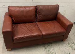 Two seater leather sofa bed (H73cm W166cm D86cm)