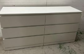 An Ikea long white chest of drawers (H77cm W160cm D49cm)